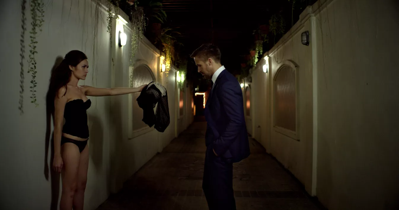 ONLY GOD FORGIVES - Still of Yayaying Rhatha Phongam and Ryan Gosling